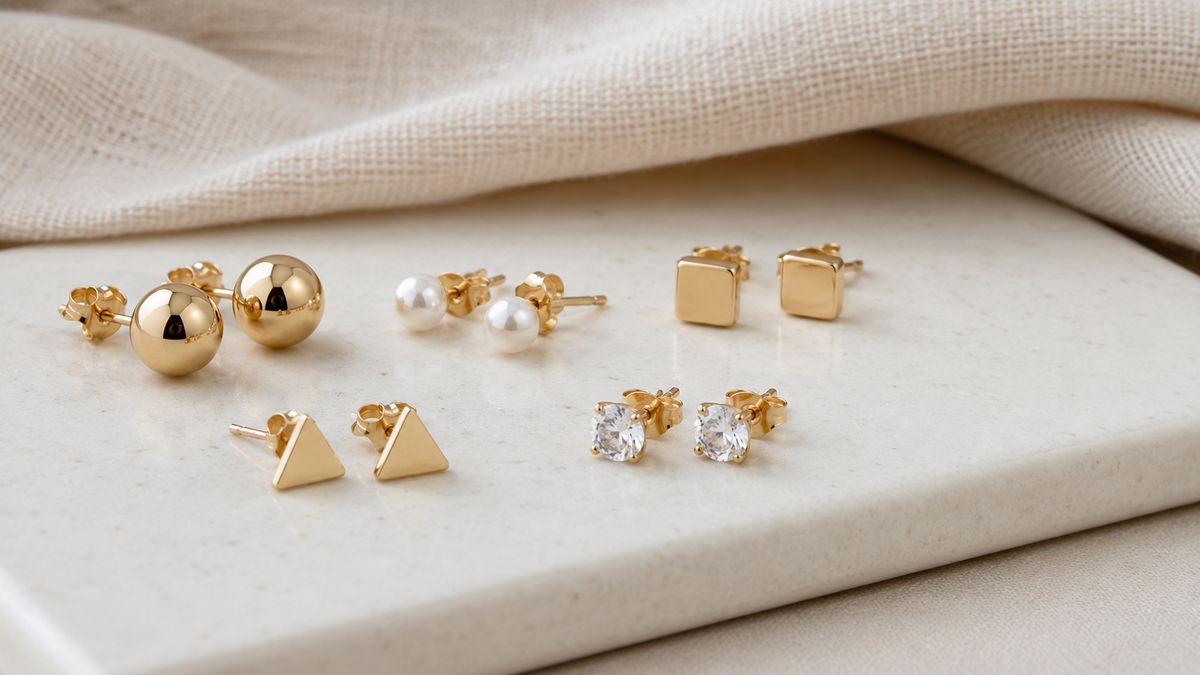 Wholesale gold-tone stud earrings with pearl, geometric and cubic zirconia details