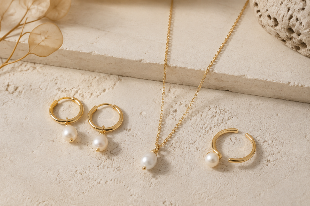 Pearl earrings and necklaces photographed as a cohesive wholesale jewelry collection