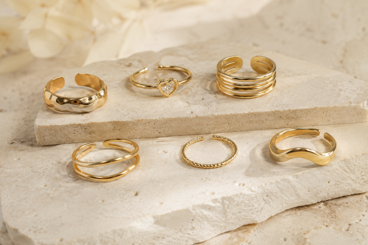 Stackable and open gold rings photographed for a wholesale ring assortment