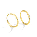 Gold-Plated Brass Round Earrings — Elegant Profile featuring round and a gold-tone finish