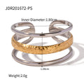 Gold-Plated Stainless Steel Statement Ring with Floral Sculptural Detail — product profile — jewelry finish and design detail