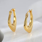 Gold-Plated Brass Geometric Asymmetric Ear Cuff Earrings in a gold-tone brass finish