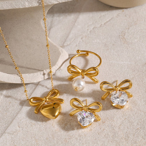 18K Gold-Tone Bow Cubic Zirconia Stainless Steel Necklace in a gold-tone stainless steel finish