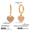 Gold-Plated Stainless Steel Stud Earrings with Heart Cubic Zirconia Detail — close-up detail — jewelry finish and design detail