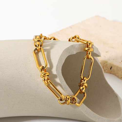 18K Gold-Tone Cross Sculptural Chain Stainless Steel Bracelet in a gold-tone stainless steel finish