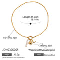Gold-Plated Stainless Steel Necklace with Freshwater Pearl Detail — product styling — jewelry finish and design detail