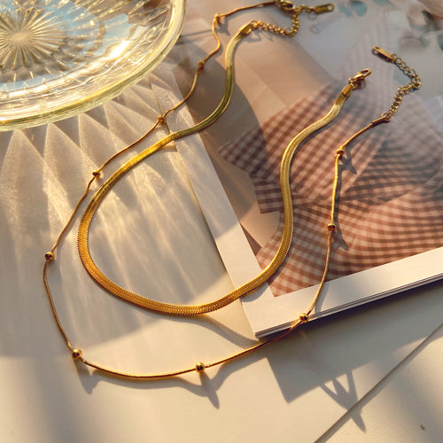 14K Gold-Tone Stainless Steel Choker Necklace with Sculptural Bead Snake Chain Detail featuring snake detailing