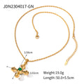 Gold-Tone Stainless Steel Cross Cubic Zirconia Pendant Necklace with Stone Detail with gold-tone stainless steel