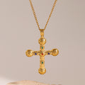 Gold-Plated Cross Cubic Zirconia Pendant Stainless Steel Necklace with Chain Detail — front view