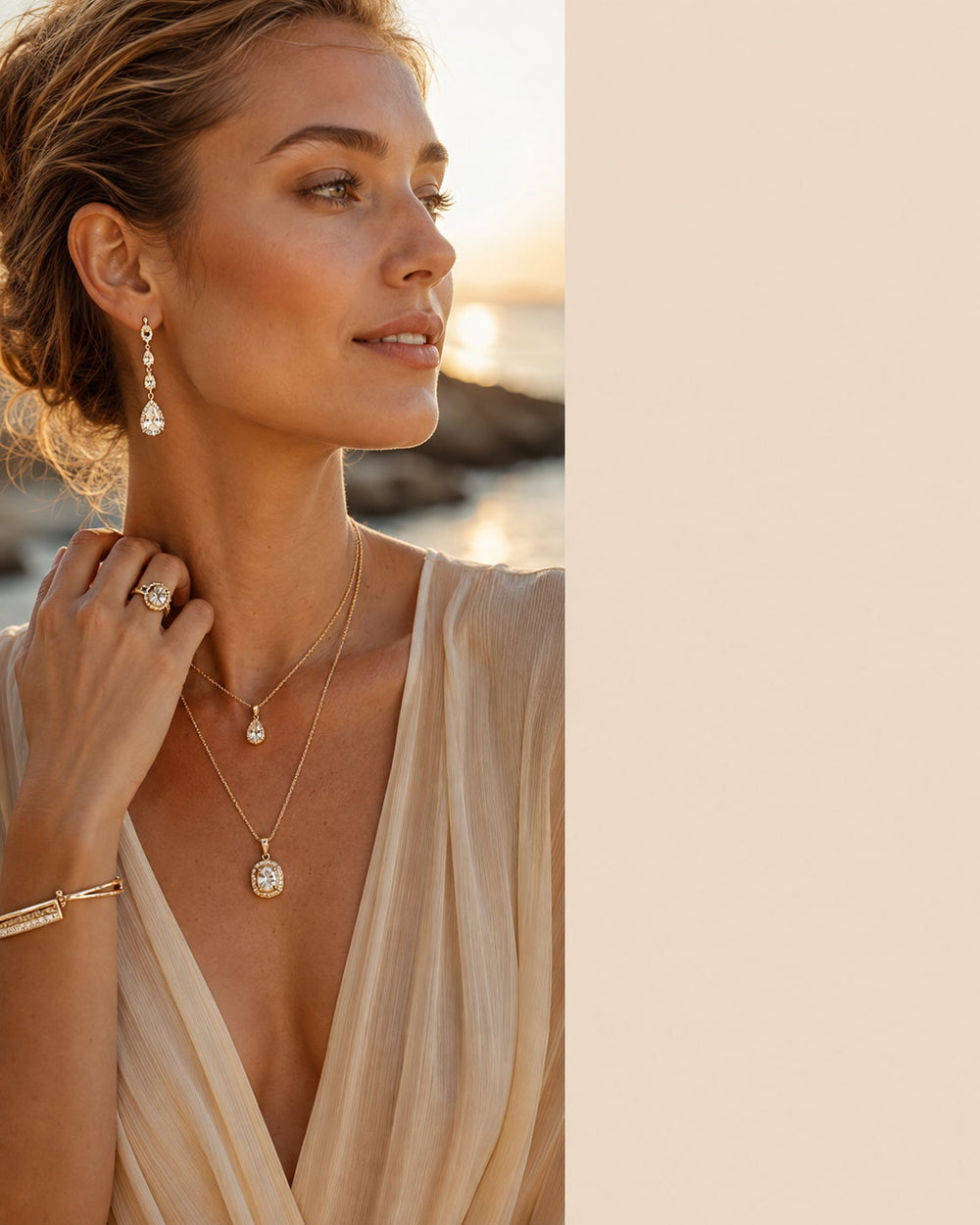 European model wearing layered gold wholesale jewelry earrings and necklaces
