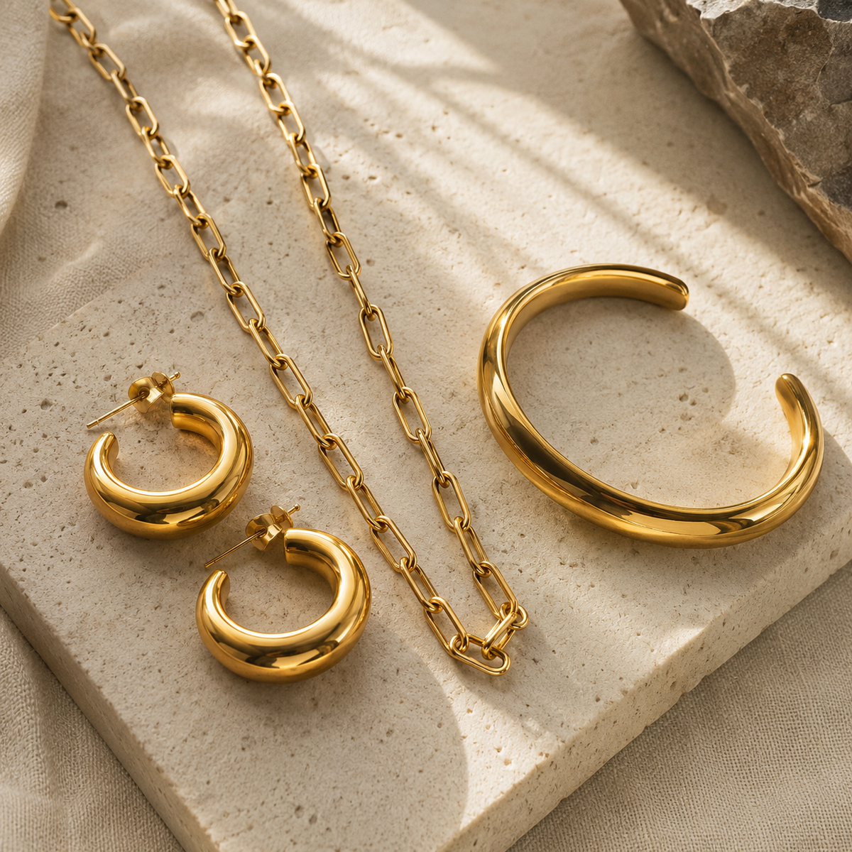 Gold-plated 316L stainless steel necklaces, hoop earrings and cuff bracelet