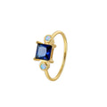 Gold-Plated Brass Sculptural Blue CZ Ring styled for independent jewelry boutiques