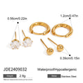 Gold-Tone Stainless Steel Hoop Earrings with Cubic Zirconia Detail with a hoop design profile