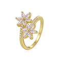 Gold-Plated Brass Floral Red CZ Ring featuring cubic zirconia and a gold-tone finish — jewelry finish and design detail