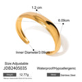 Sculptural 18K Gold-Plated Stainless Steel Cuff Bracelet — close-up detail — jewelry finish and design detail