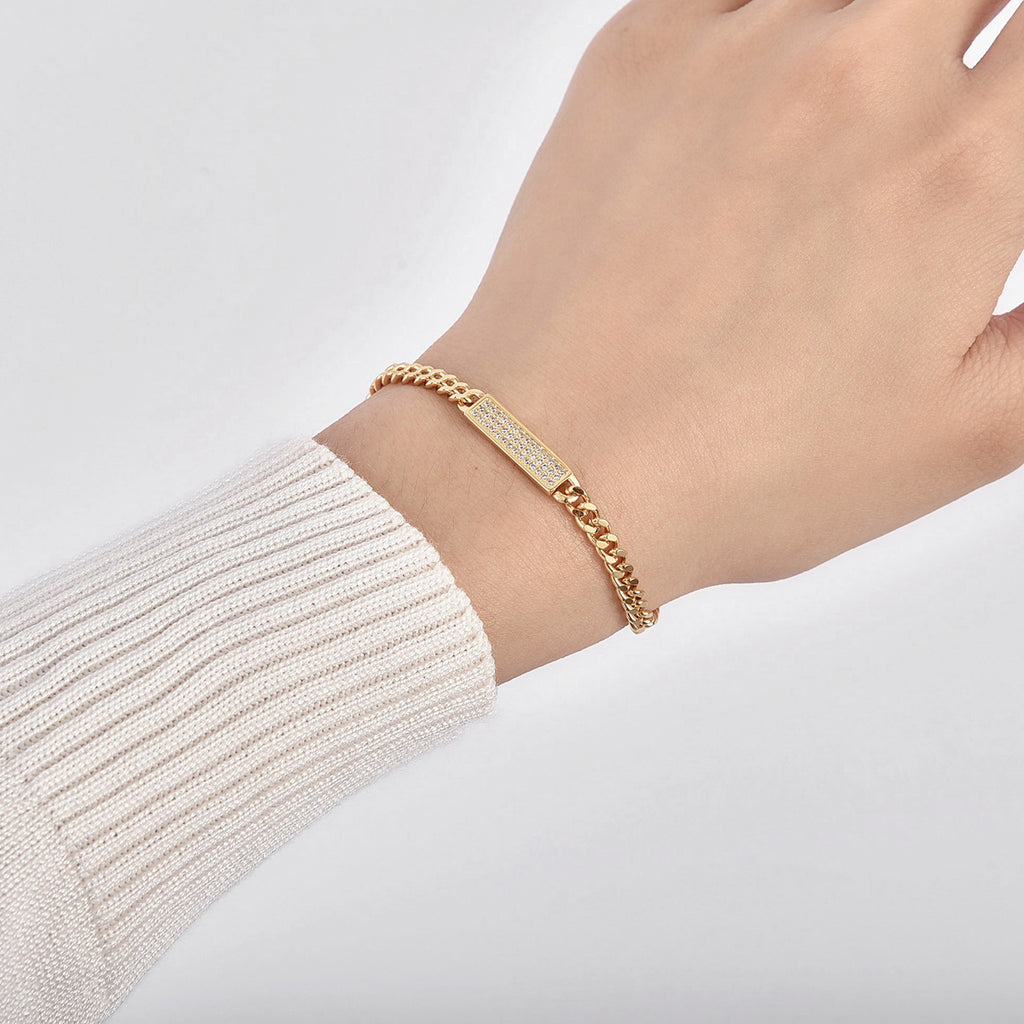 Gold-Plated Brass Cuban Link CZ Chain Bracelet with Linked Detail in a gold-tone brass finish