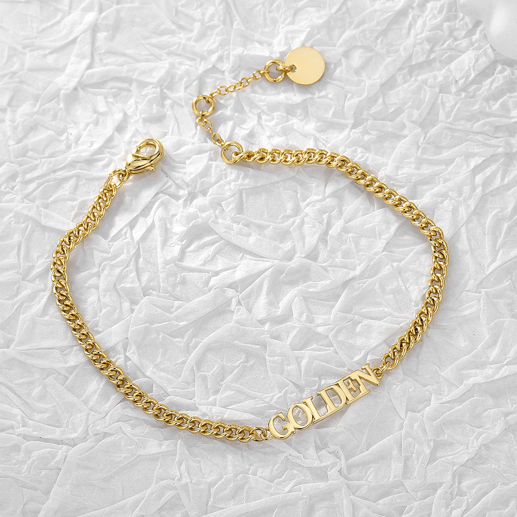 Gold-Plated Brass Cuban Link Chain Bracelet with Linked Detail in a gold-tone brass finish