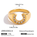 Gold-Plated Stainless Steel Ring with Cubic Zirconia Detail — Soft Contour — close-up detail — jewelry finish and design detail