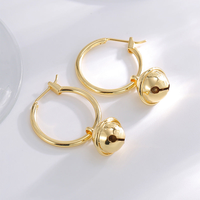 Gold-Plated Brass Openwork Earrings in a gold-tone brass finish