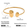 Gold-Plated Stainless Steel Cuff Bracelet with Teardrop Open Profile Detail — material detail — jewelry finish and design detail