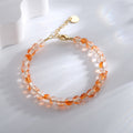 Gold-Plated Brass Bow Beaded Bracelet with gold-tone brass construction — jewelry finish and design detail