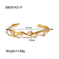 Gold-Plated Stainless Steel Cuff Bracelet with Pearl Open Profile Detail — close-up detail — jewelry finish and design detail