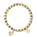 Gold-Plated Brass Music Note Beaded CZ Bracelet with gold-tone brass construction