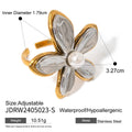 Gold-Plated Stainless Steel Statement Ring with Floral Sculptural Detail — material detail — jewelry finish and design detail