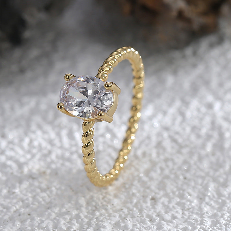 CYR0580 Fashion Retro Twisted Pattern Ring for Women Copper Plated with Real Gold Oval Zircon Ring