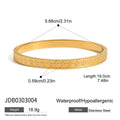 Gold-Plated Stainless Steel Bangle Bracelet with Cubic Zirconia Detail — finish detail — jewelry finish and design detail