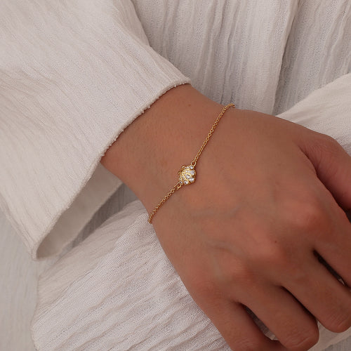 14K Gold-Plated Brass Shell CZ Bracelet featuring cubic zirconia detailing