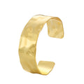 Gold-Plated Brass Hammered Asymmetric Bracelet with a asymmetric design profile