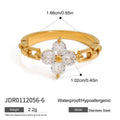 Gold-Tone Stainless Steel Ring with Four-Leaf Clover Cubic Zirconia Detail featuring cubic zirconia and a gold-tone