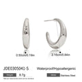 Modern Gold-Plated Stainless Steel Stud Earrings — Defined Silhouette — detail view — jewelry finish and design detail