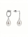 Gold-Plated Brass Geometric Pearl Earrings with a geometric design profile — jewelry finish and design detail