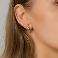 Gold-Plated Brass Sculptural Hoop Earrings in a gold-tone brass finish