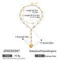 Gold-Plated Stainless Steel Lariat Necklace with Cross Detail — material detail — jewelry finish and design detail
