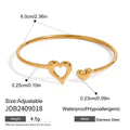 Gold-Plated Stainless Steel Cuff Bracelet with Teardrop Open Profile Detail — close-up detail — jewelry finish and design detail