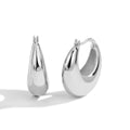 Gold-Plated Brass C-Shaped Earrings featuring contemporary and a gold-tone finish — jewelry finish and design detail