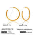 Stainless Steel Hoop Earrings in Gold-Plated — Soft Contour — close-up detail — jewelry finish and design detail