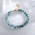 Gold-Plated Brass Bow Beaded Bracelet with beaded and polished details — jewelry finish and design detail