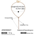 Polished Stainless Steel Lariat Necklace with Cubic Zirconia Detail made with a gold-tone stainless steel base — jewelry finish and design detail