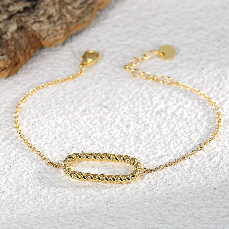 B0090   Simple Gold-Plated Braided Oval Bracelet for Women Woven Circle Hollow Egg-Shaped Bangle