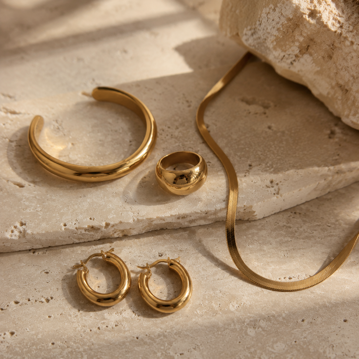 Custom 316L stainless steel gold-plated necklace, hoop earrings, signet ring and cuff bracelet