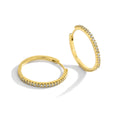 Gold-Plated Brass Sculptural CZ Hoop Earrings in a gold-tone brass finish