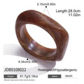 Gold-Plated Brass Asymmetric Enamel Bracelet made with a gold-tone brass base — jewelry finish and design detail
