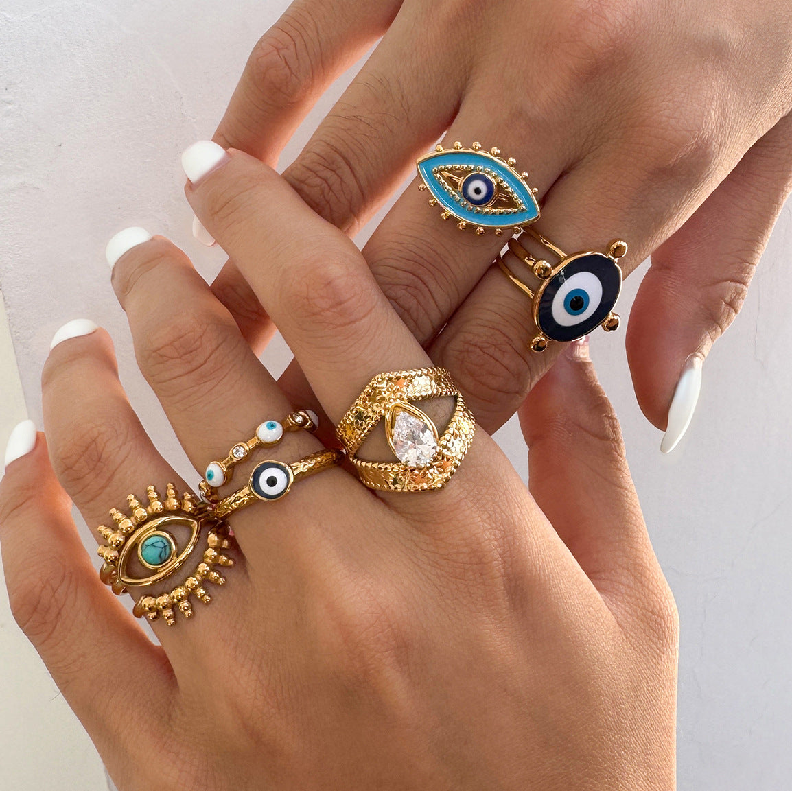 Evil Eye Gold-Tone Stainless Steel Ring featuring contemporary detailing