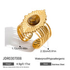 Evil Eye Gold-Tone Stainless Steel Ring shown as part of a fashion jewelry collection
