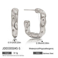 Modern Gold-Tone Stainless Steel Hoop Earrings — Defined Silhouette with gold-tone stainless steel construction