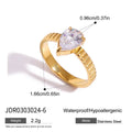 Gold-Plated Stainless Steel Ring with Cubic Zirconia Detail — Soft Contour — product styling — jewelry finish and design detail